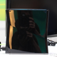 Illustration for article titled The New Xbox 360 in Person: So Glossy It Hurts